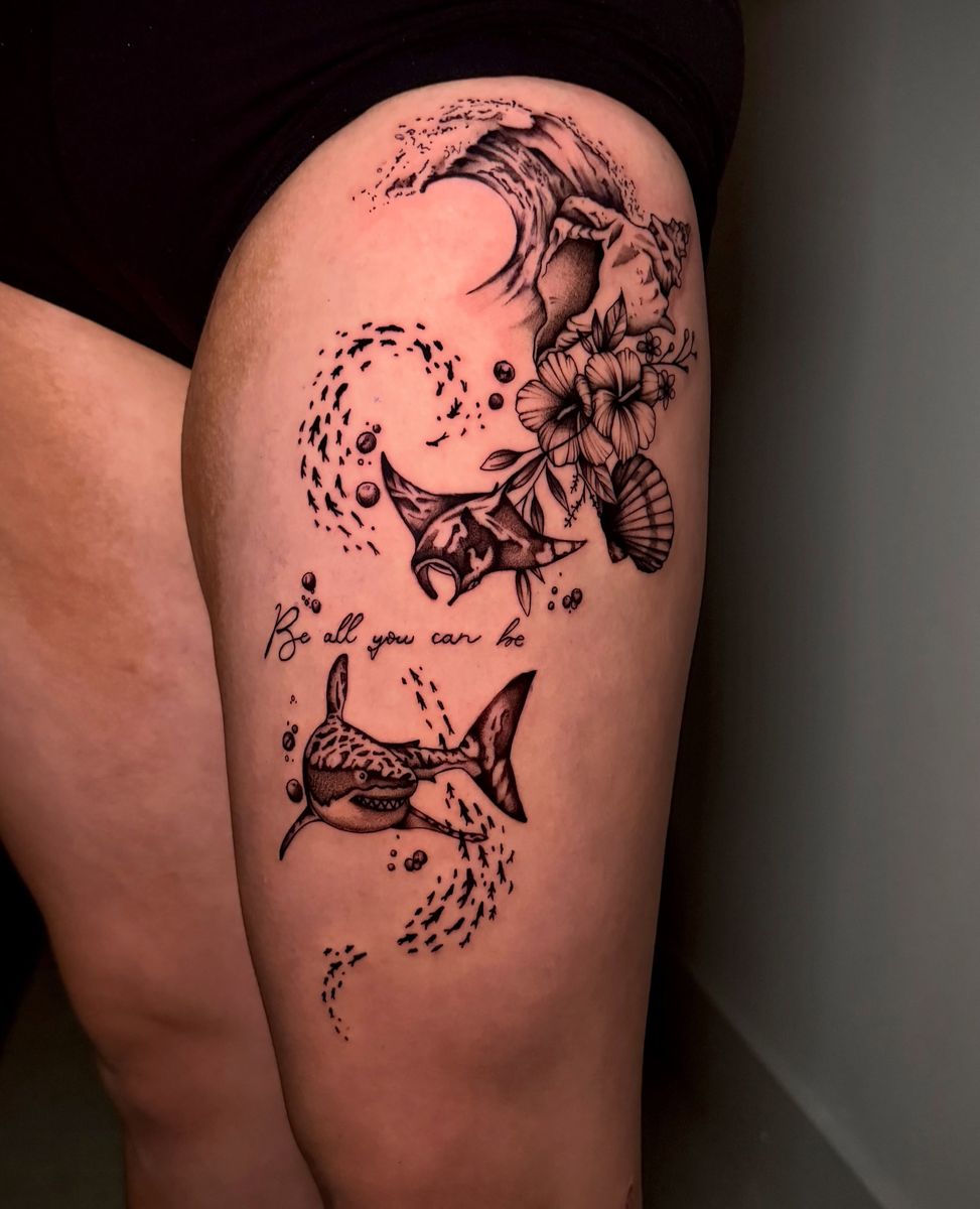 Ocean-themed thigh tattoo by Abram