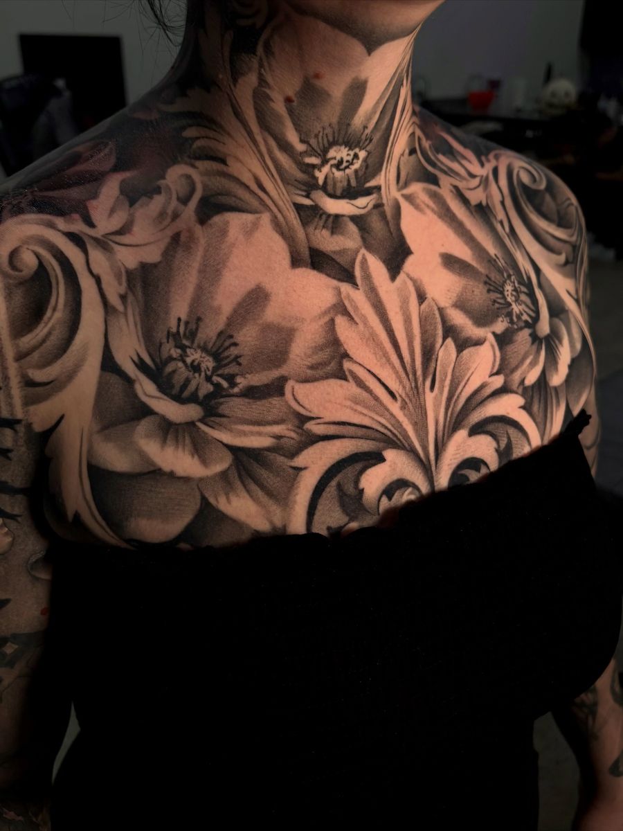 Healed black & grey floral chest piece by guest artist Pretty Wings Ink